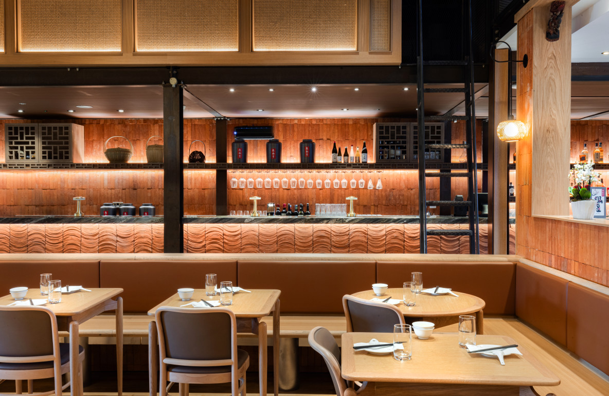 Close-up of bespoke timber joinery and banquette seating handcrafted by ECSEC Ltd for Din Tai Fung Canary Wharf