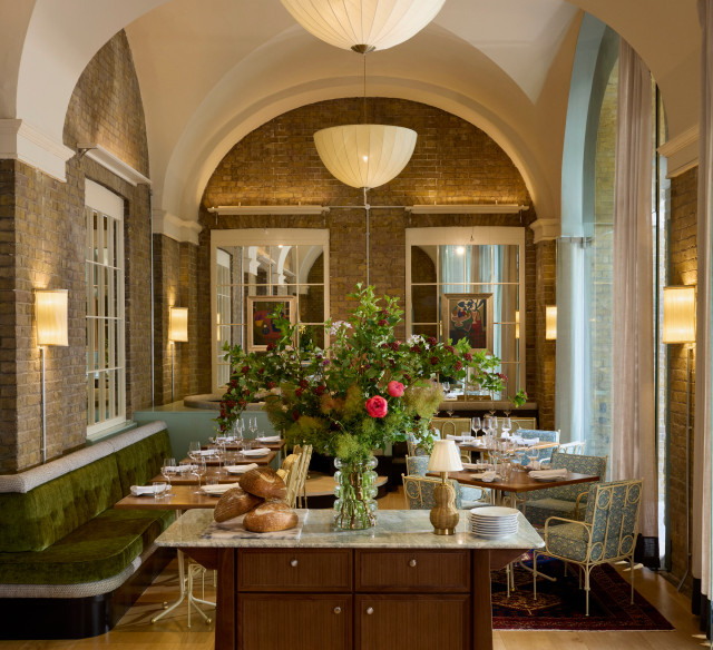 Café Linea Chelsea main dining area featuring bespoke timber seating and soft lighting by ECSEC Ltd