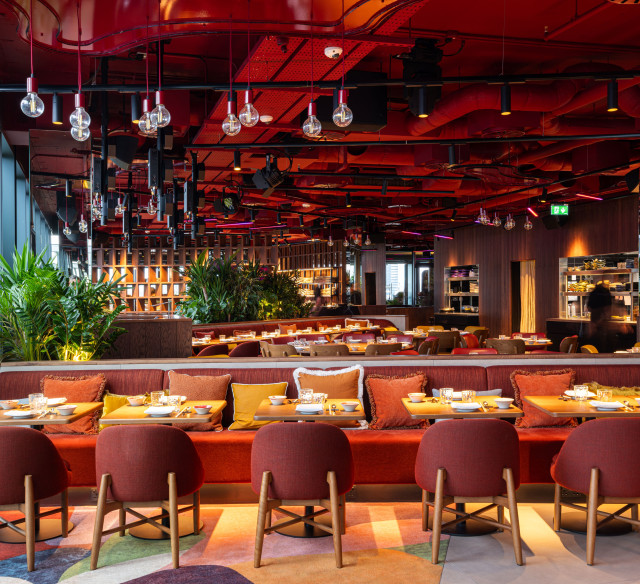 Completed restaurant fit-out for Chotto Matte Manchester with open dining space and artistic wall finishes